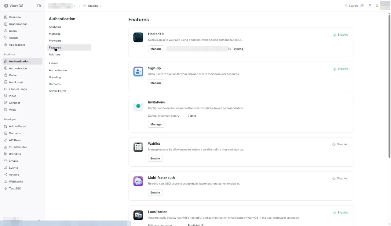 The Authentication Features page. Hosted UI is Enabled with its staging AuthKit address blurred, Sign-up is Enabled with a Manage button, Invitations has a default invitation expiry of 7 days, and Waitlist and Multi-factor auth are Disabled.