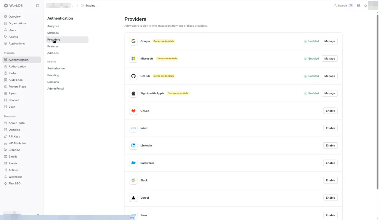 The Authentication Providers page. Google, Microsoft, GitHub, and Sign in with Apple are Enabled, each tagged Demo credentials with a Manage button. GitLab, Intuit, LinkedIn, Salesforce, Slack, Vercel, and Xero have Enable buttons.