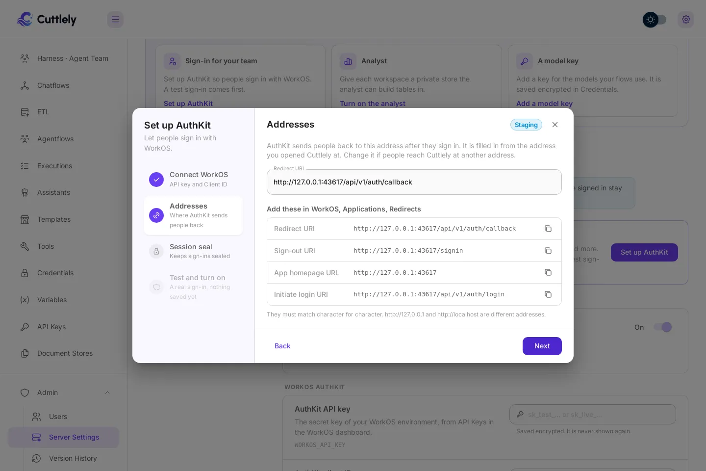 Set up AuthKit, step 2, Addresses: the redirect URI and the sign-in, homepage and sign-out addresses to copy into WorkOS, each with a copy button.