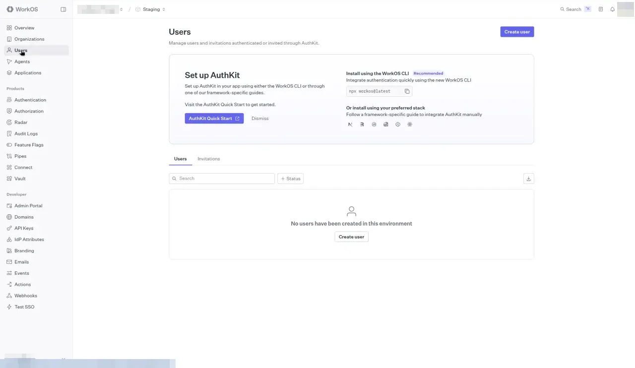 The WorkOS Users page with a Set up AuthKit card, Users and Invitations tabs, a Search box, a Status filter, and the message No users have been created in this environment.